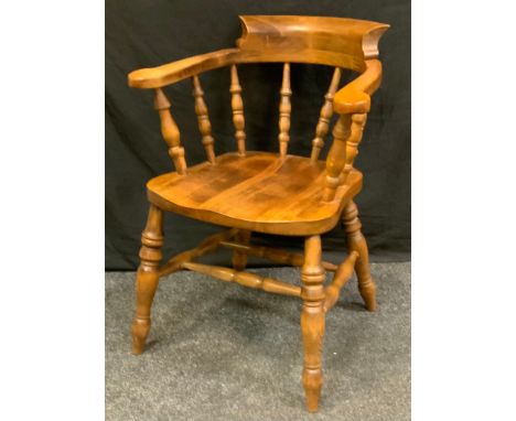 Ash and Elm smokers bow, turned spindles, saddle seat, double `H` stretchers, turned legs, 88cm high 