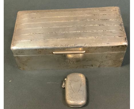 A George IV silver deck top double cigarette box, London 1925, 513.8g;  an Edwardian silver vesta case, Birmingham 1902, 32g 