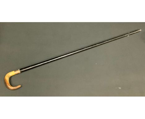 A George V 9ct gold mounted walking stick, curved horn handle, 9ct gold ferule, presented by the Electricals Staff Holyhead t