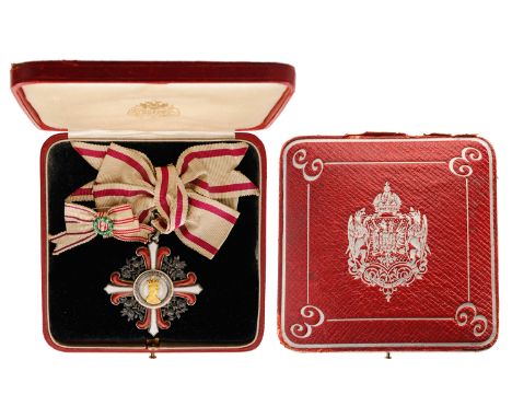 A 2nd Class decoration: the cross in silver with red and white enameled arms, 52x49mm, silver roses and branches, with fine e