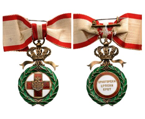 A Badge of the 3rd Model, 55x32 mm,in gilt Silver and enamels,with separately made medallions, the obverse with Montenegro’s 