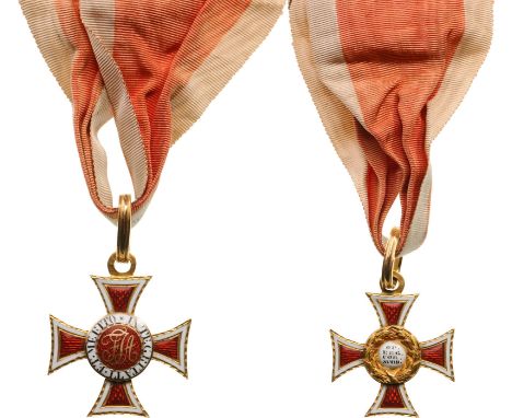 An early Knight’s Cross 1st model, 2nd type (without oak leaves between the arms); 43x26 mm, GOLD, with white bordered, red e