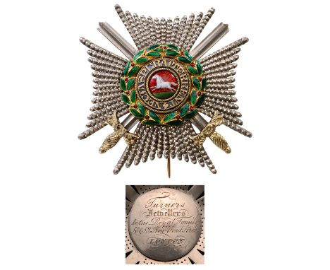 A Commander’s Breast Star with Swords 80 mm, chiselled and pierced arms with golden swords between them; centre medallion wit