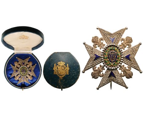 A Commander’s breast star of reduced size, 66x61mm, with chiselled and pierced arms and blue enameled,gold details; centre me