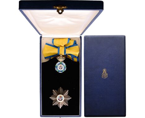 A complete group of Dame Grand Cross, 1st type, 70x42 mm, gilt Silver badgewith pale blue (a small chip) and green enameled d