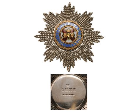 A breast star of the Order, 76 mm, chiseled and pierced silver rays; white enameled centre medallion with golden, green ename