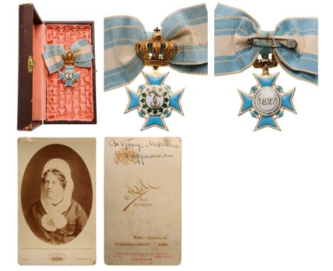 A Cross of the Order with Brilliants in GOLD, 70x40 mm, white-bordered, blue enameled cross withlozenges between the arms ena