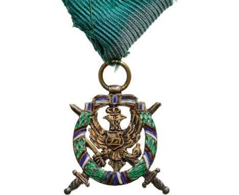 A Miniature in gilt Silver, 21x20 mm, with polychrome enameled obverse; the reverse, finelyengraved; with suspension ring, or