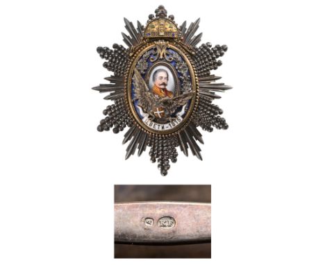 A Grand Cross Star of the Order, 84X68 mm, highly convex breast star inSilver with alternately diamond-cut chiselled/pierced 