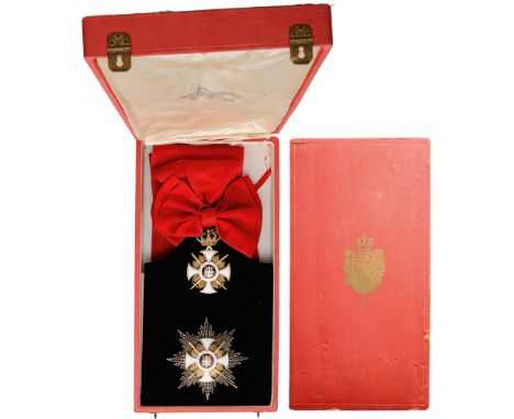 A 1st Class Set with Swords of the Type awarded from 1915: sash badge,77x47 mm, in gilt Silver, white enamelled cross’s arms,