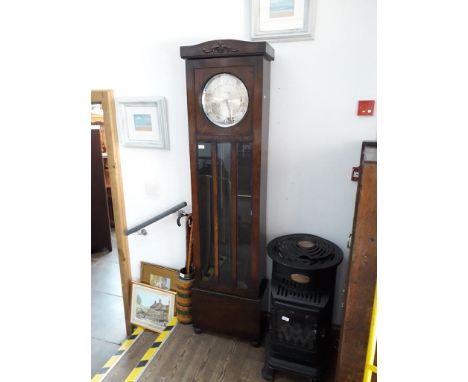 A 1920s West Minster chiming oak longcase clock with three weights and pendulum, height 195cm. 