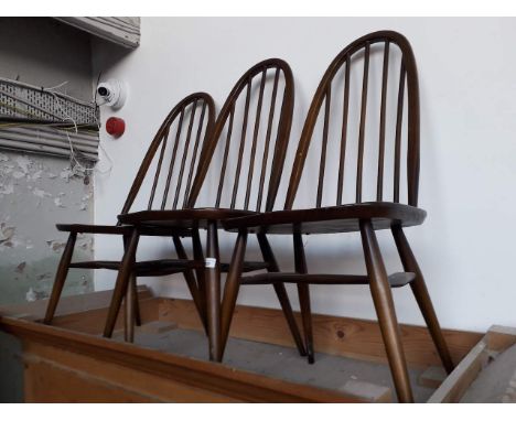 A set of three Ercol elm and beech spindle back chairs in Golden Dawn finish. 