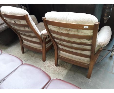 A pair of Ercol armchairs. 