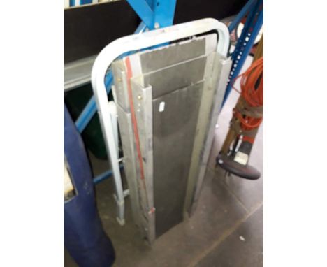 2 adjustable ramps and a small metal step ladder 