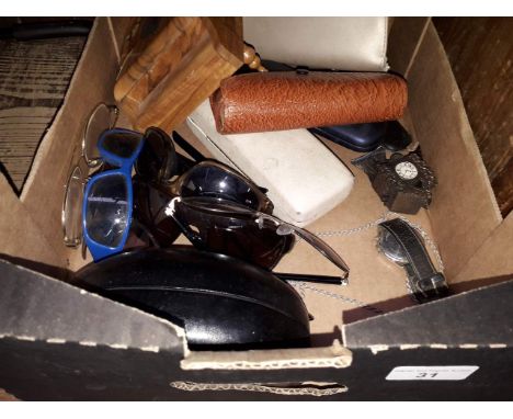 A box of collectables including sunglasses, glasses cases, musical box, cigarette lighter etc 