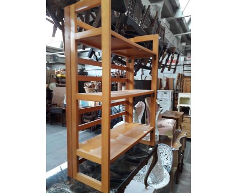 Folding light wood open shelves. 