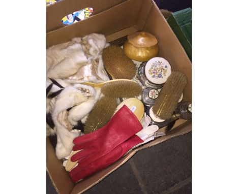 A box of dressing table sets, brushes and vintage leather gloves. 