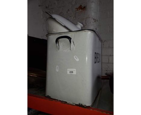 An enamel bread bin and a bed pan 
