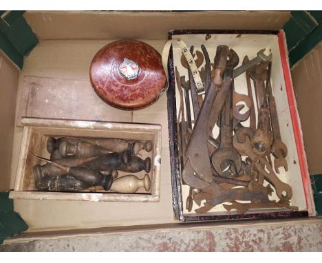 A box of vintage tools. 