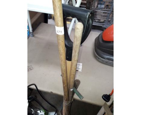 A bundle of garden tools including rake, hoe etc 