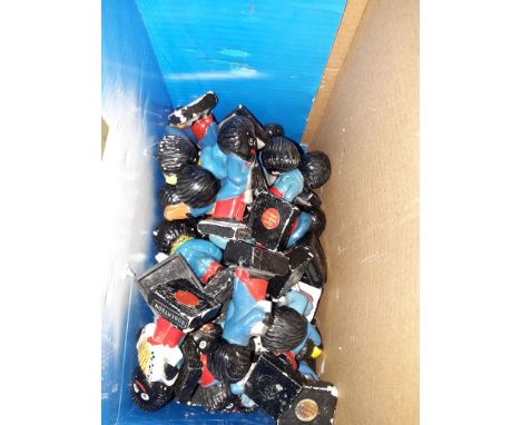 A box of ceramic Robertsons Golly figures 