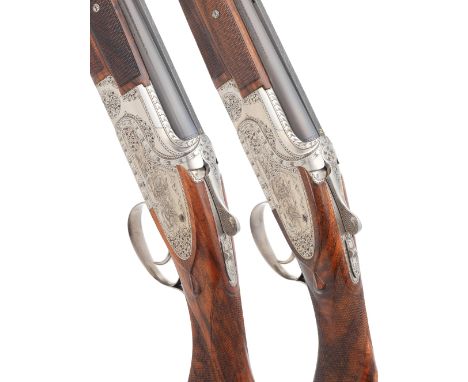 A fine pair of C. Perfido-engraved 20-bore 'B25 F1' single-trigger side-plated over-and-under ejector guns by Browning, no. 3