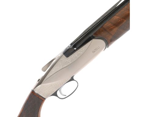 A 12-bore '828U' single-trigger over-and-under ejector gun by Benelli, no. BS023102P17Hold-open top-lever, fully selective si
