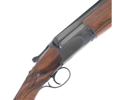 A 12-bore 'MX12' single-trigger over-and-under ejector gun by Perazzi, no. 96444Hold-open toplever, selective single-trigger 