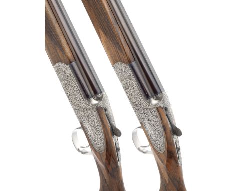 A pair of 12-bore 'The Sporting Model' side-plated single-trigger over-and-under ejector guns by Holland &amp; Holland, no. 5