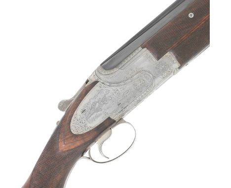 A 12-bore side-plated single-trigger over-and-under ejector gun by Browning, no. 8K3PM02540The lockplates with scenes of game