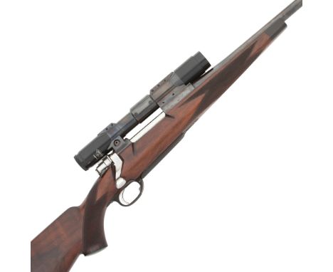 A .264 (Win. Mag.) bolt-magazine rifle by David Lloyd, no. 222Side-safety, the Mauser action-body with thumb-recess and charg