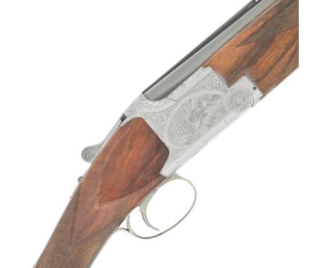 A Rizzuto-engraved 12-bore 'B25 B2G' single-trigger over-and-under ejector gun by Browning, no. 325MM03327Hold-open toplever,