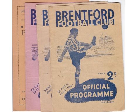 BRENTFORD        Four home programmes v. Tottenham Hotspur 24/3/1945 with annotations, v. Portsmouth and Cardiff 1946/7 and v