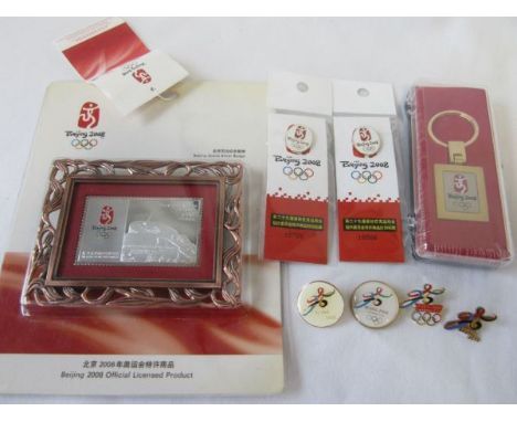 OLYMPIC GAMES 2008 BEIJING  Collection of official souvenirs from Beijing 2008 Olympic Games, a metal keyring with the Beijin