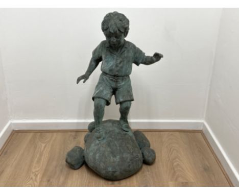 Large Bronze child statue “stand on the rocks” Patina to bronze in green finish, fantastic piece of garden art, signed to bas