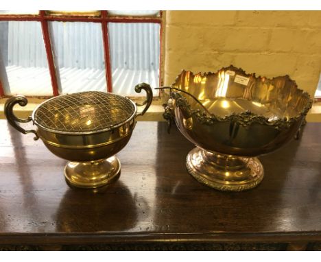 A silver plated punch bowl with lion head handles and ladle together with a silver plated rose bowl.