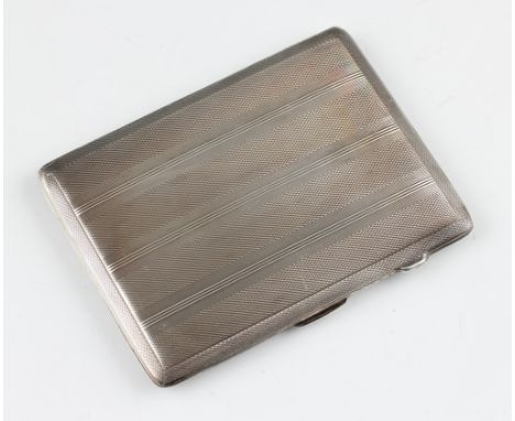 A silver cigarette case, of rectangular form featuring engine turned design, gilt interior engraved 'Presented to Mr A. E. Ho