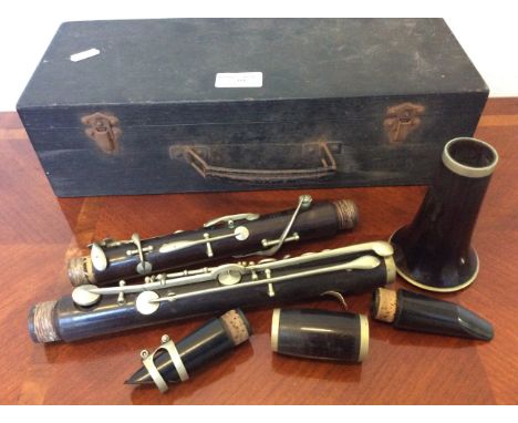 An E.J. Albert, Brussells, rosewood clarinet in box.