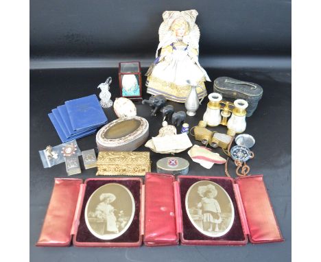 Mother of pearl opera glasses &amp; one other set, two leather cased photographs, trinket boxes, 4 Decimal coin sets, matchbo