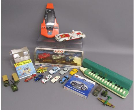 Collection of toys includes Galaxy Invader 10000, Hohner Melodica-soprano, Made in Japan tin Porsche racing car, Dinky classi