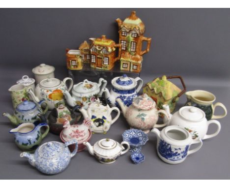 Collection of mostly teapots - includes Arthur Wood, robin teapot that plays jingle bells, Wade, Price Kensington Cottage War