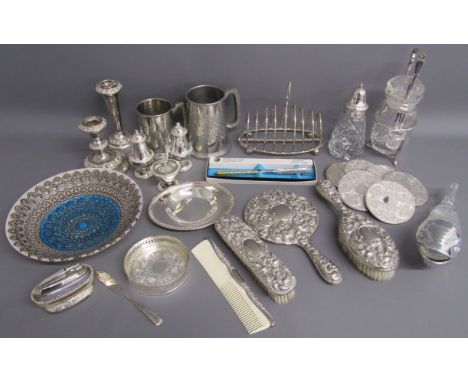 Silver plate includes toast rack, pickle jar with fork, cosmic pickle fork, coasters, glass dish with silvered detailing, can