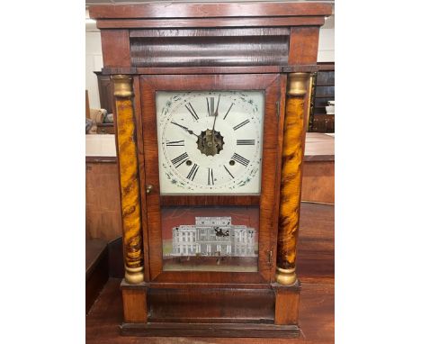 Late 19th century Empire style split column wall clock by E N Welch of America with 8 day spring movement striking a gong wit
