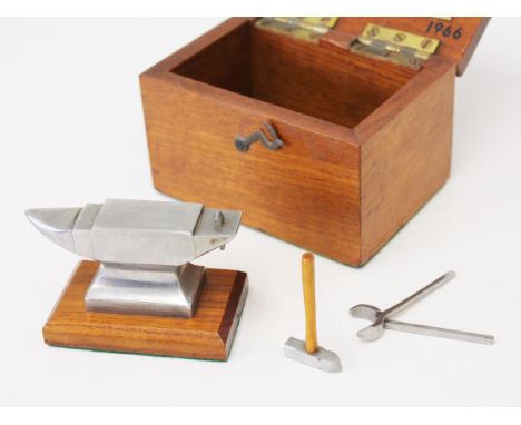 A miniature presentation anvil with tools and box. L12cm