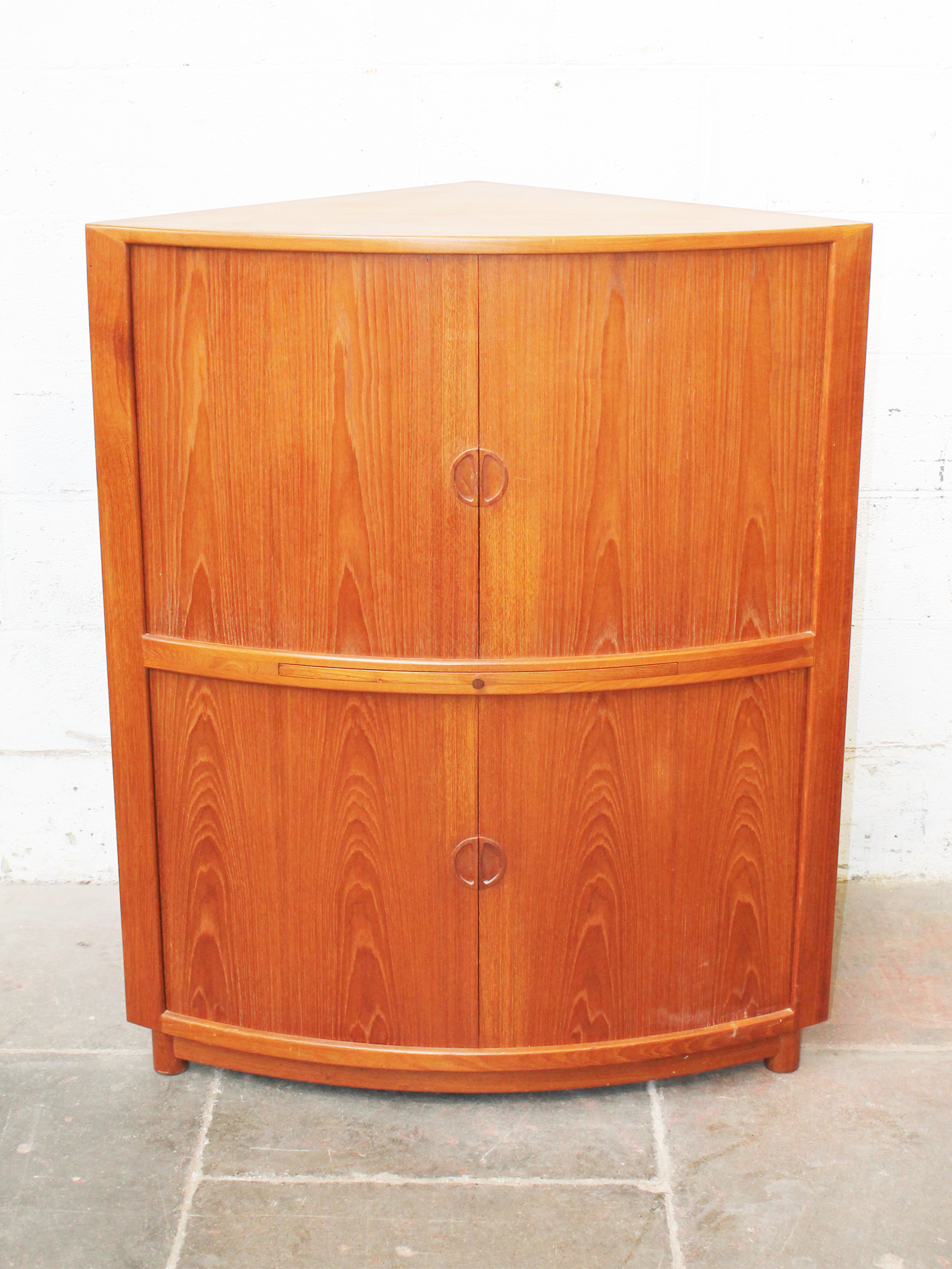 A Danish Teak Corner Cocktail Cabinet With Tambour Doors And Glass