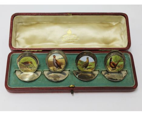 A set of four Edwardian silver menu holders each having enamelled decoration of a bird. Sampson Mordan &amp; Co. Ltd. Chester