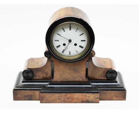 A walnut and ebonised mantel clock. L39cm