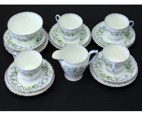 A Shelley part tea set consisting cream, sugar, four cups, six saucers and six plates. Condition - very good, no damage, mino