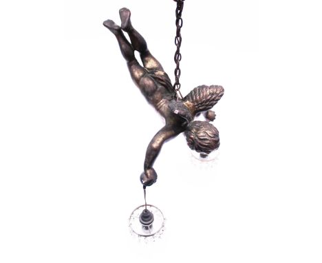 A 1930s cherub drop lustre light fitting. Length of cherub 33cm. Condition - minor chips to cherub otherwise good