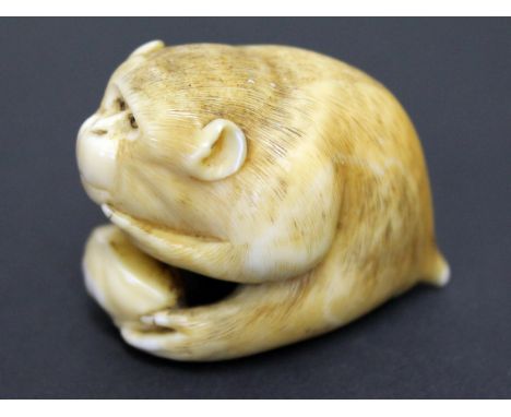 A Japanese carved ivory netsuke by Masatami. L3.8cm. Condition - minor chips to tail, thumb and first finger otherwise ok.